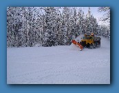 Plow coming down road